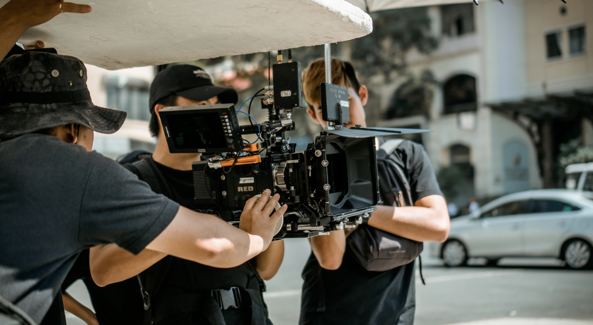 Camera operator and crew filming at studio in Washington DC